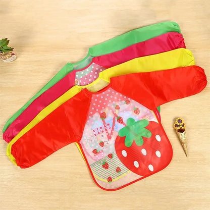 Bavoir imperméable à manches longues