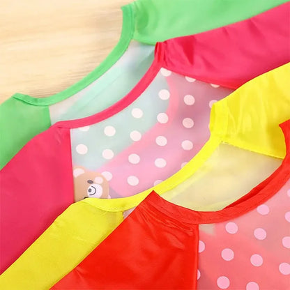 Bavoir imperméable à manches longues