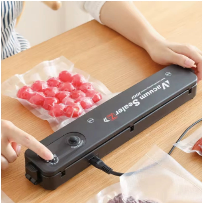 Machine d'emballage sous vide + 10 sacs sous vide